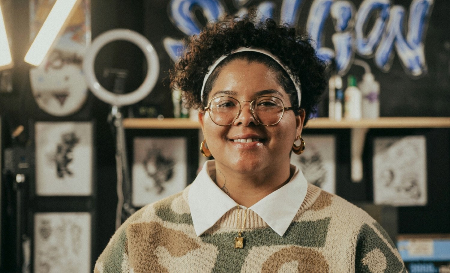A small-business owner in her salon — the people First Brick designs for