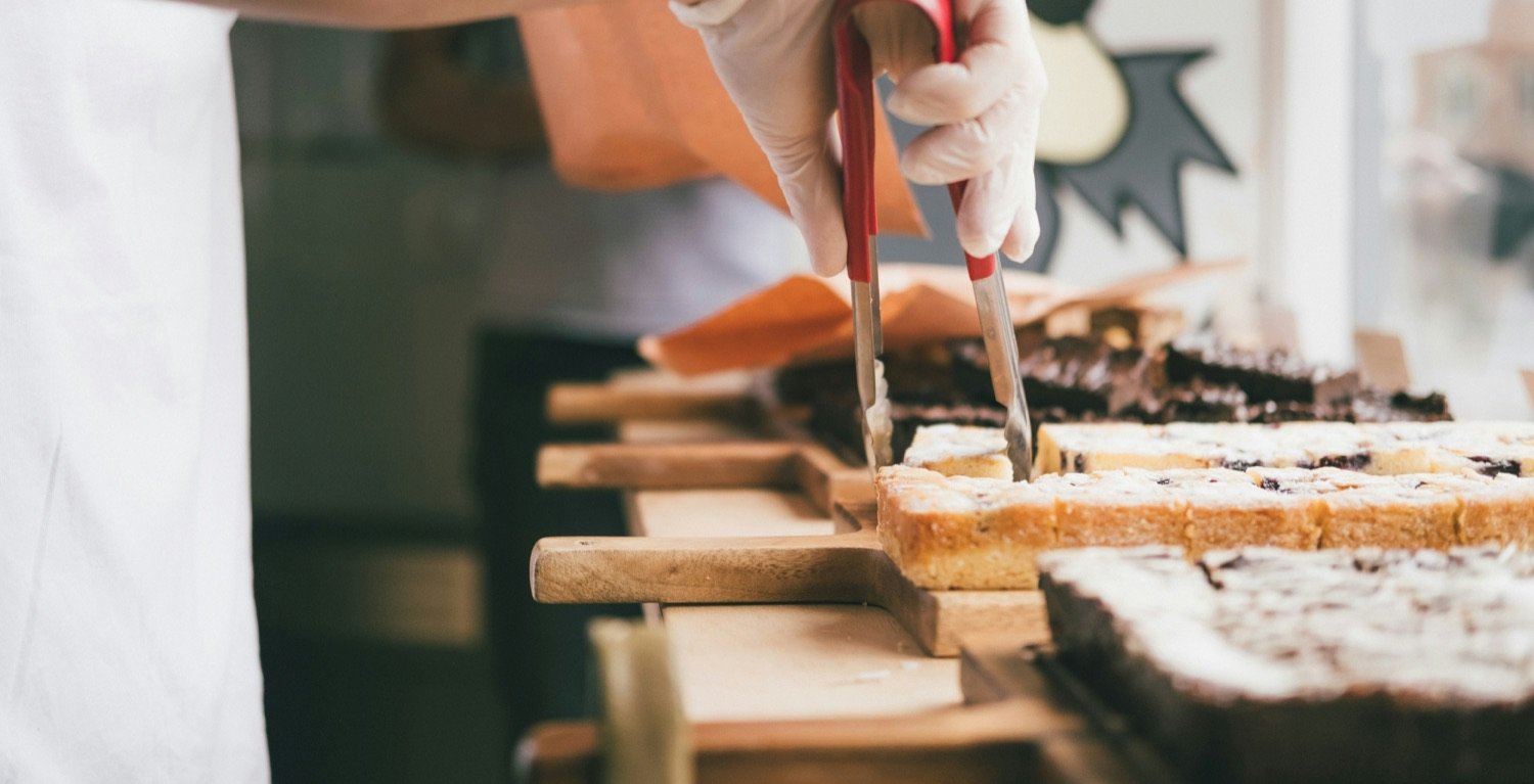 A small-business owner at work — the outcomes First Brick designs for