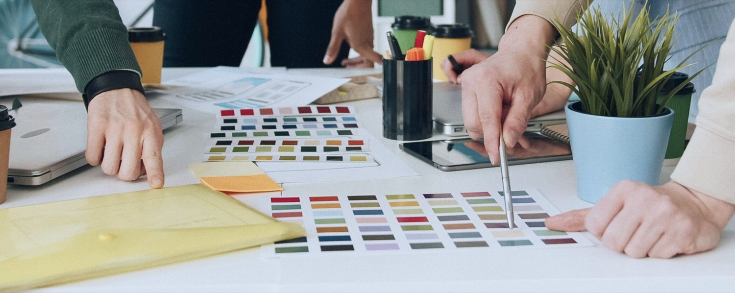 A small-business owner reviewing colour and material swatches